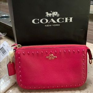 COACH women’s Rivets Nolita wristlet 19